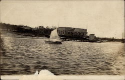 A Sailboat on the Water with Docks in Background Seabrook, TX Postcard Postcard