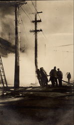 Firemen putting out a fire Postcard Postcard