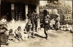 Native Americans in front of House Postcard