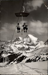 Ski Lift Going up the Mountain with Skiers Skiing Postcard Postcard