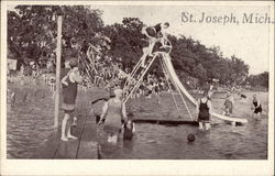 Sliding and Swimming on the Lake St. Joseph, MI Postcard Postcard