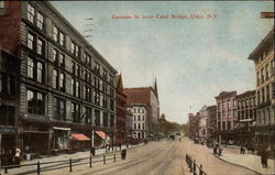 View of Genesee St. from Canal Bridge Utica, NY Postcard Postcard