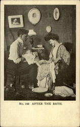 Parents with newborn after bath Postcard