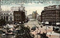 Downtown Scene with Trolley Cars Postcard