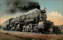 Train engine steaming by Postcard