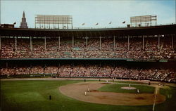 Cleveland Indians in Action at Cleveland Municipal Stadium Ohio Postcard Postcard