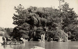 Men canoing in Gold State Park Postcard