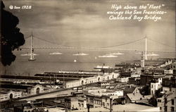 High above the "Fleet" swings the San Francisco-Oakland Bay Bridge California Postcard Postcard