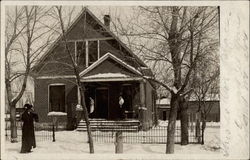 Three women in snow in front of house Postcard Postcard