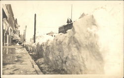 Snowbank lining sidewalk Boulder, CO Postcard Postcard