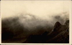 Scene of mountain or volcano in clouds Postcard