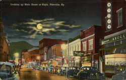 Looking up Main Street at night Postcard