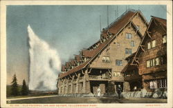 Old Faithful Inn and geyser Yellowstone National Park, WY Postcard Postcard