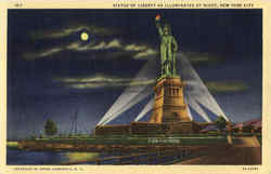 Statue of Liberty As Illuminated At Night New York City, NY Postcard Postcard