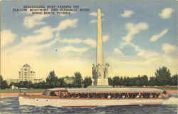 Sightseeing Boat Passing The Flagler Monument and Flamingo Hotel Miami Beach, FL Postcard Postcard