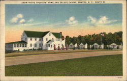 Snow White Tourists' Home and Deluxe Cabins Postcard