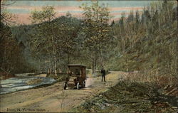 Old car on dirt road Postcard