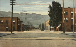 View of Fourth Street, showing City hall and Hellinger Hotel Lewiston, ID Postcard Postcard