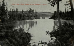 Clear Lake with Three Sisters in the Distance Oregon Postcard Postcard