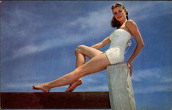 Woman in White Bathing Suit, Sunbathing on cement pier Swimsuits & Pinup Postcard Postcard