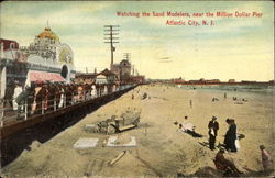 Watching the Sand Modelers, near the Million Dollar Pier Postcard