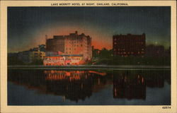 Lake Merritt Hotel at Night Oakland, CA Postcard Postcard