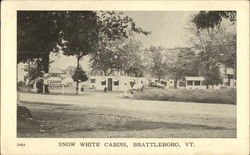 Snow White Cabins Postcard