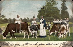 Babies nursing cows Postcard