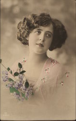 Girl Holding Purple Flowers Postcard