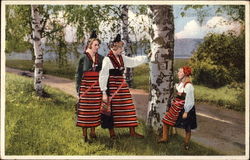 Two Women and Girl in Traditional Dress Postcard