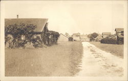 Homes on Lane Through Town Postcard