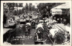 Decorated Boats on River Postcard