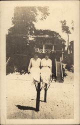 Two Women in Front of Beach Home Postcard