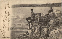 African Women Bathing by the Sea Postcard