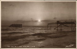 The Long Day Closes - Sunset at Alum Bay Postcard