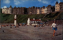 View of Lighthouse and Beach Postcard