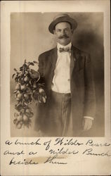 A Bunch of Wilder Pears Being Held by Gentleman Fruit Postcard Postcard