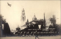 Scout above Naval Training Station Postcard