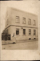 Butcher outside of shop Postcard