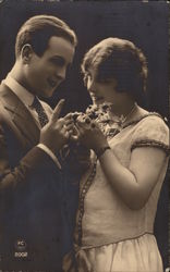 Beau Giving Girl Flowers Postcard