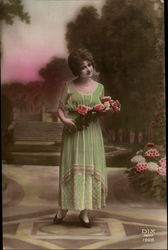 Young Woman in Green Dress with Red Bouquet of Flowers Women Postcard Postcard