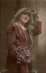 Young Woman in Green Hat and Brown Coat Holding Poppies Postcard