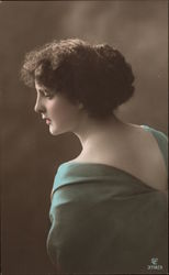 Profile of Woman in Green Dress Postcard