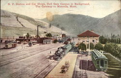 NP Station and Car Shops, Hell Gate Canyon in Background Missoula, MT Postcard Postcard