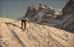 Man skiing down a hill Postcard