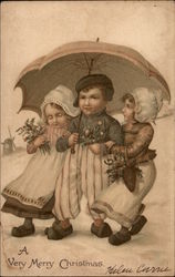 A Very Merry Christmas - Dutch Children Carrying Umbrella Postcard