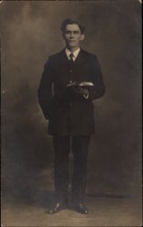 Portrait of Gentleman Holding Book Postcard