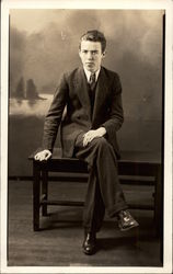 Man Sitting Cross-Legged on Bench Men Postcard Postcard