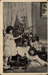 Little Girls in Christmas Morning Scene Children Postcard Postcard