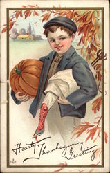 Boy carrying a Pumpkin and a Dead Turkey Postcard